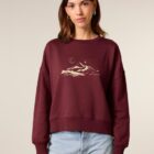 Sweat femme en coton biologique de couleur bordeau avec le dessin d'une montagne et écrit silence, la sérigraphie est de couleur beige.