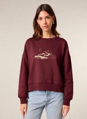 Sweat femme en coton biologique de couleur bordeau avec le dessin d'une montagne et écrit silence, la sérigraphie est de couleur beige.