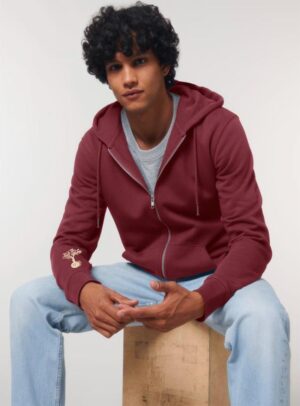 Veste sweat pour homme et femme en coton biologique de couleur bordeau avec un dessin sur la manche d'un arbre et d'une planète, la sérigraphie est de couleur beige.